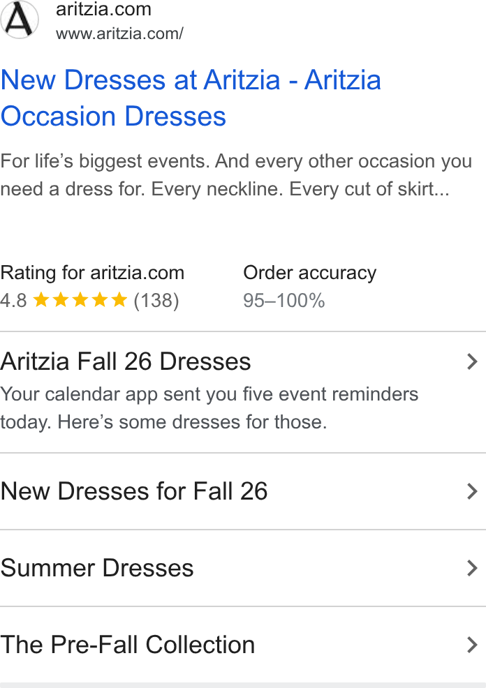 An Aritzia search ad in the Ads Transparency Center with a 4.8 star seller rating and four dress sitelinks
