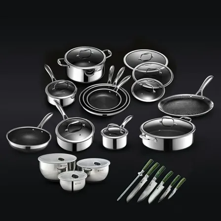 A HexClad ad creative: a full set of hybrid pans, pots, lids, bowls and knives arranged on black