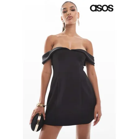 An ASOS ad in the Pinterest Ads Repository: a model in a black off-the-shoulder mini dress holding a black clutch