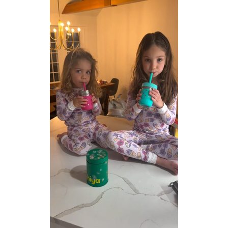 A UGC ad opening on two children in pyjamas sitting on the floor