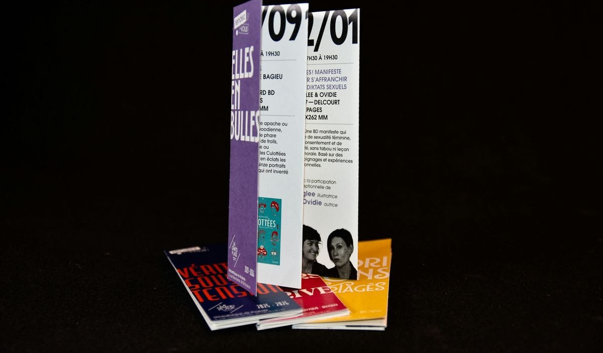 Folded printed brochures stand in a stack: long copy works when each block answers a question the buyer already has