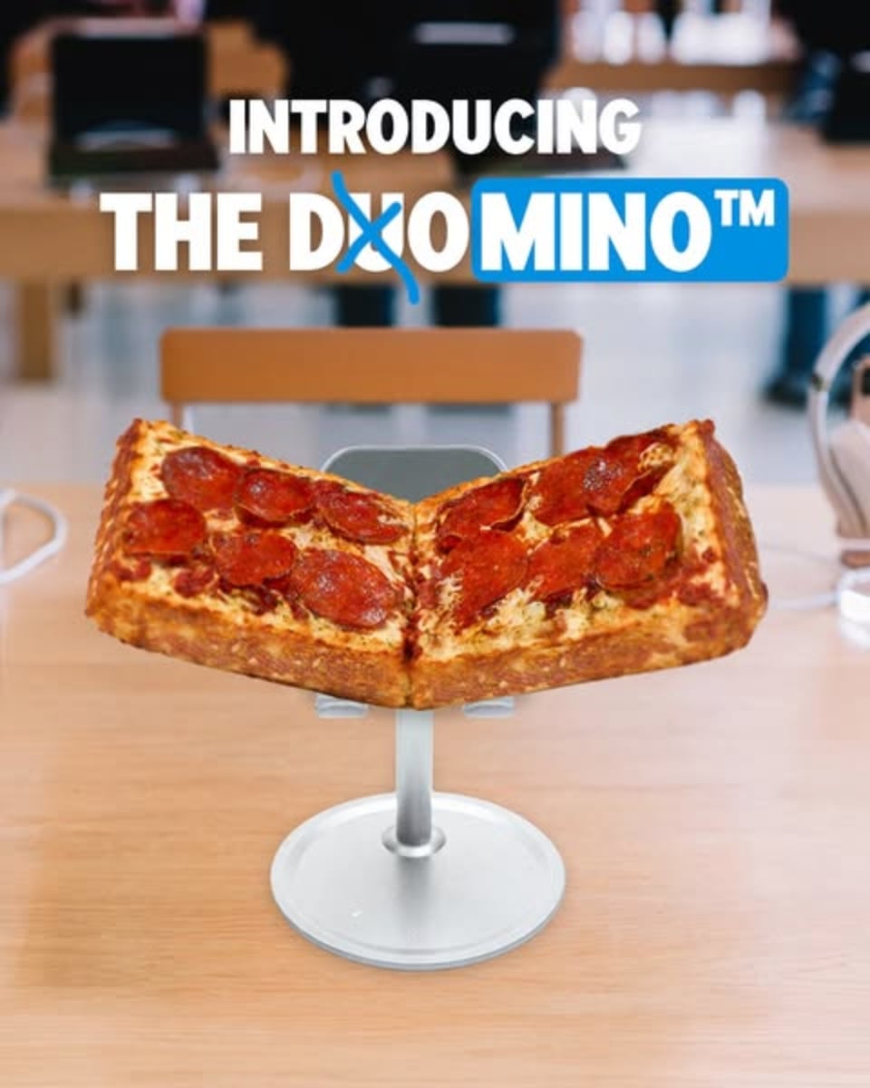 An ad by Domino's in the Meta Ad Library: Introducing the Duomino, with Duo crossed out, over a folded pan pizza on a phone stand
