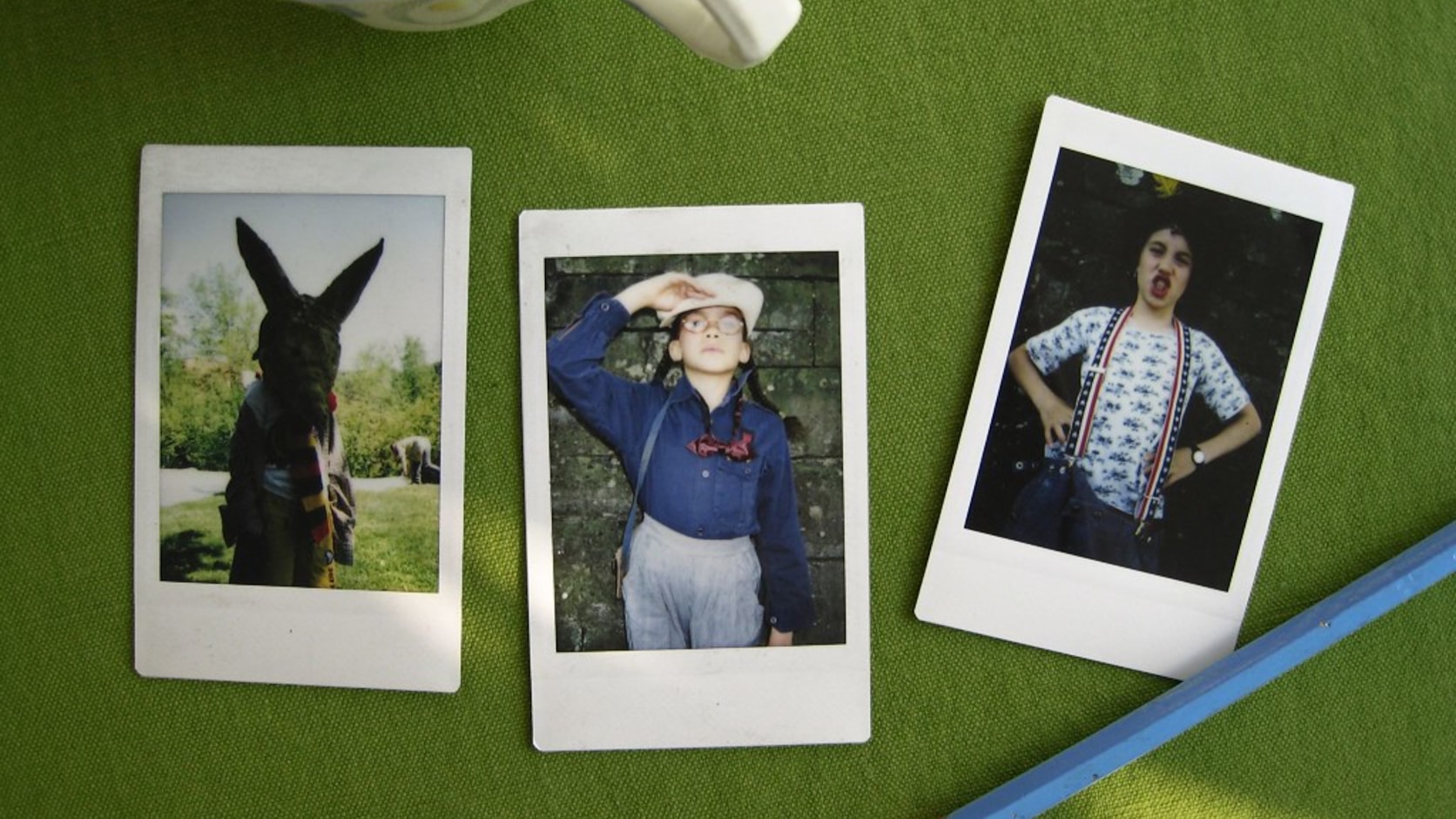 Three instant photos laid out left to right on a green surface: a carousel is a sequence read in order, not a gallery