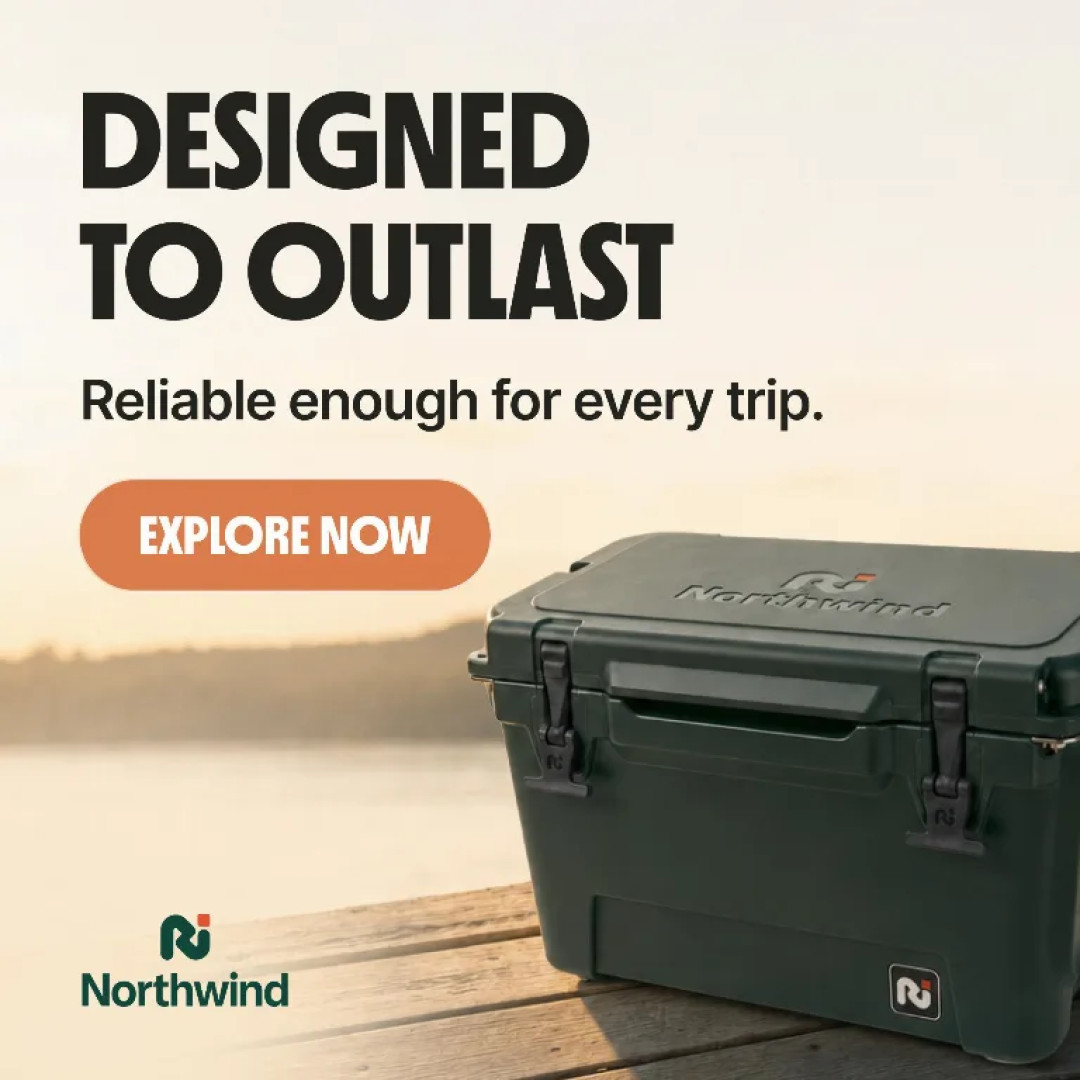 A cooler-box post with DESIGNED TO OUTLAST set hard against the left edge of the frame