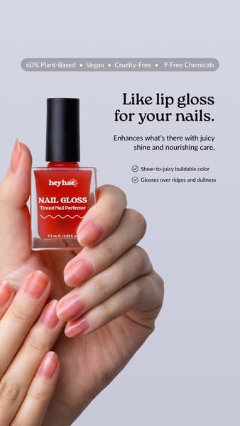 An Instagram story ad by Heyhae Gel Nail in Meta's Ad Library: Like lip gloss for your nails, next to a hand holding a red bottle of nail gloss