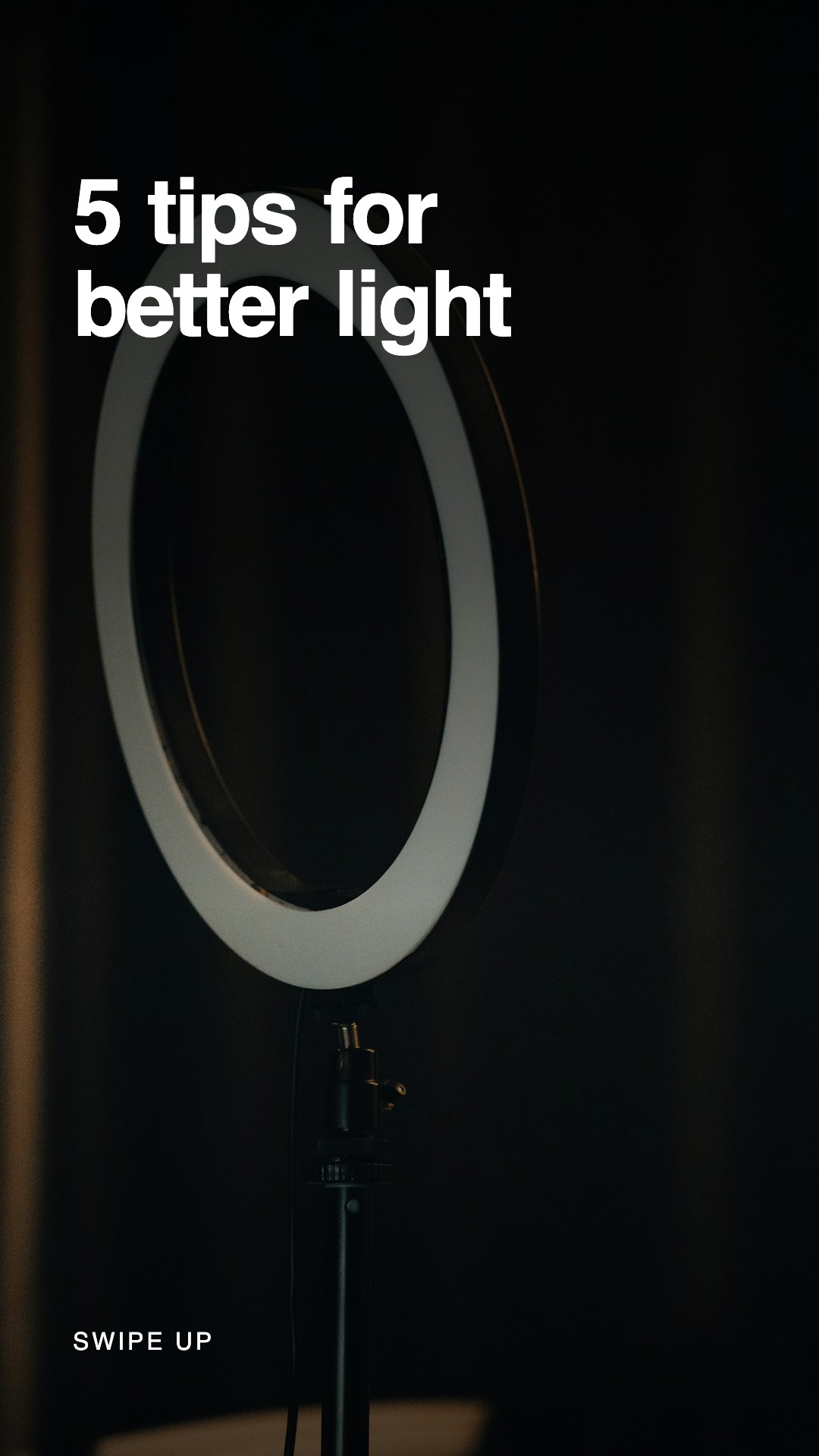 A story frame over a ring light in a dark room, reading 5 tips for better light, labelled swipe up