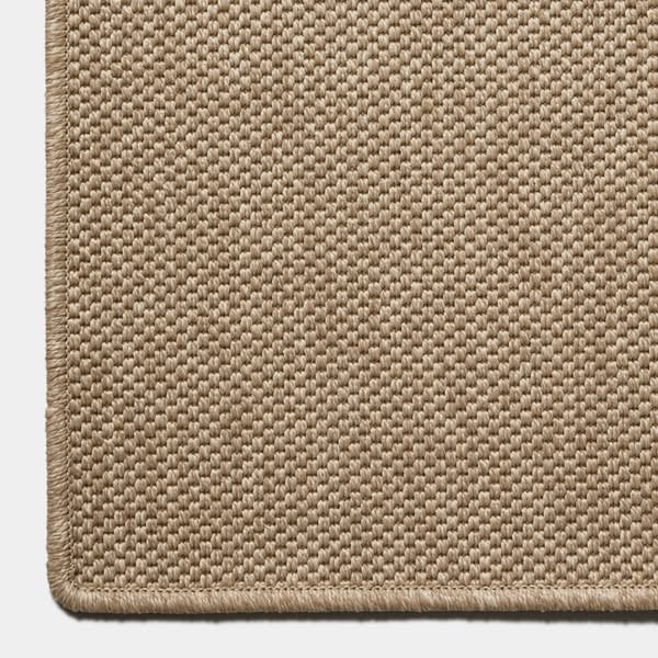 An ad by Ernesta in Meta's Ad Library: Order samples and get $50 off your next rug purchase, over a close-up of the corner of the Marci Salt indoor and outdoor rug