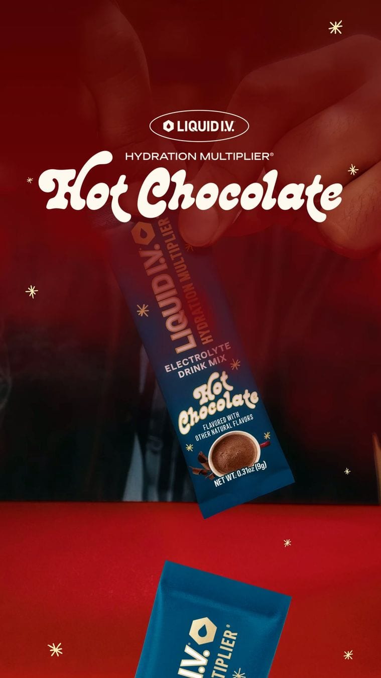 The opening frame of a six-second Liquid I.V. video ad in Meta's Ad Library: a Hot Chocolate hydration packet on a dark red background with stars