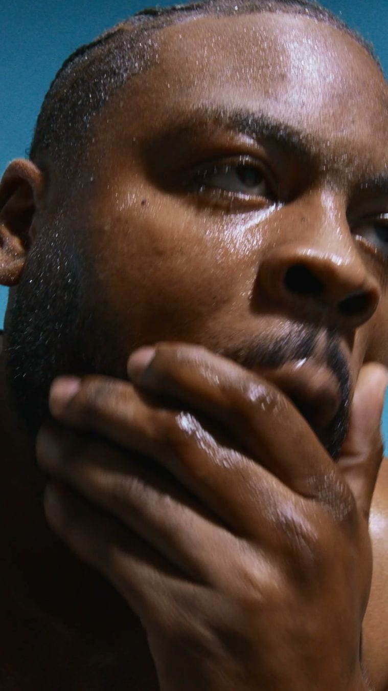 The opening frame of a six-second Liquid I.V. video ad in Meta's Ad Library: a close-up of a sweating man's face, his hand on his chin