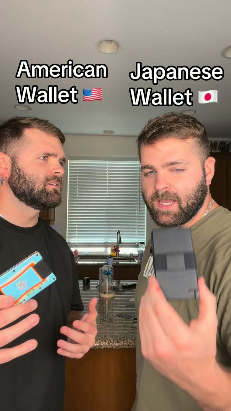 The opening frame of a video ad by The Ridge in Meta's Ad Library: two men in a kitchen under the captions American Wallet and Japanese Wallet, one holding a slim metal wallet