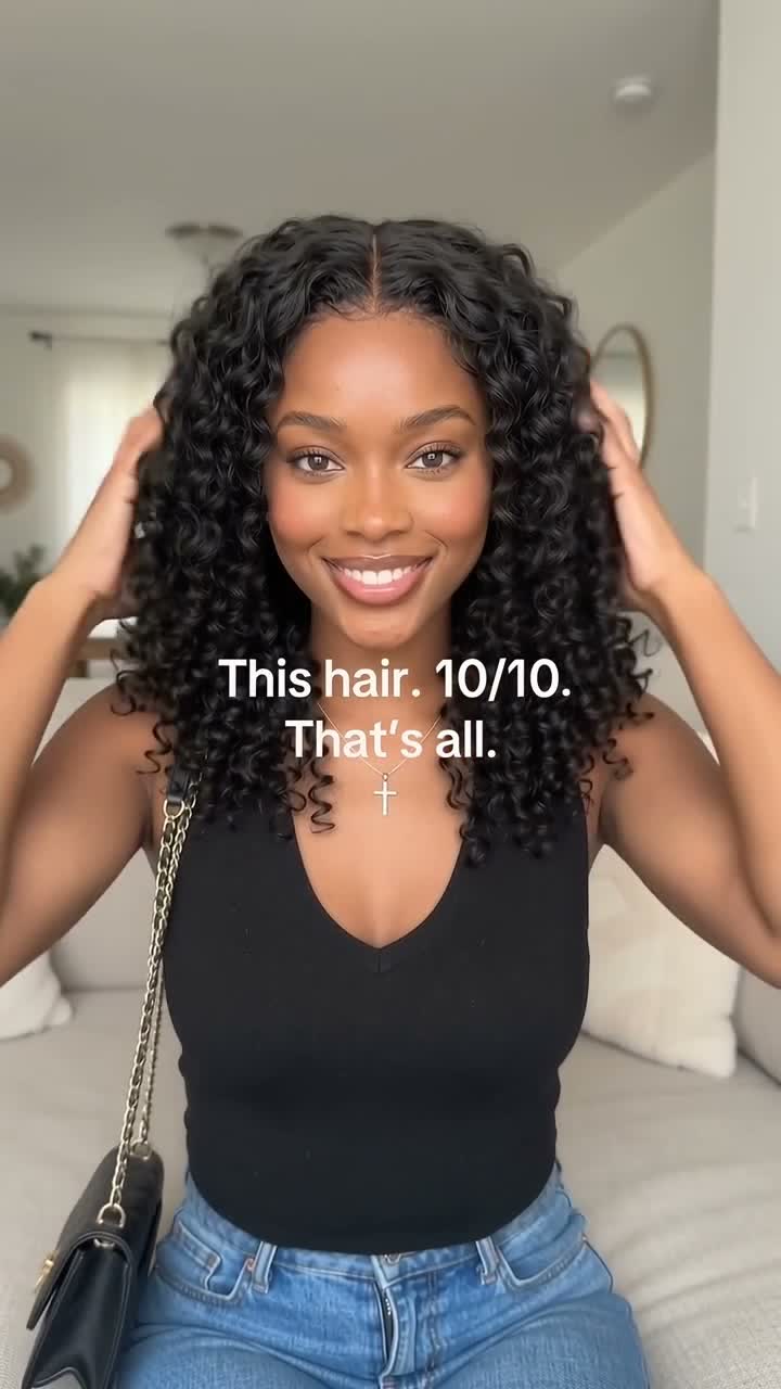 A hair brand's creator ad on TikTok: a woman touching her curls with the caption this hair 10/10, that's all