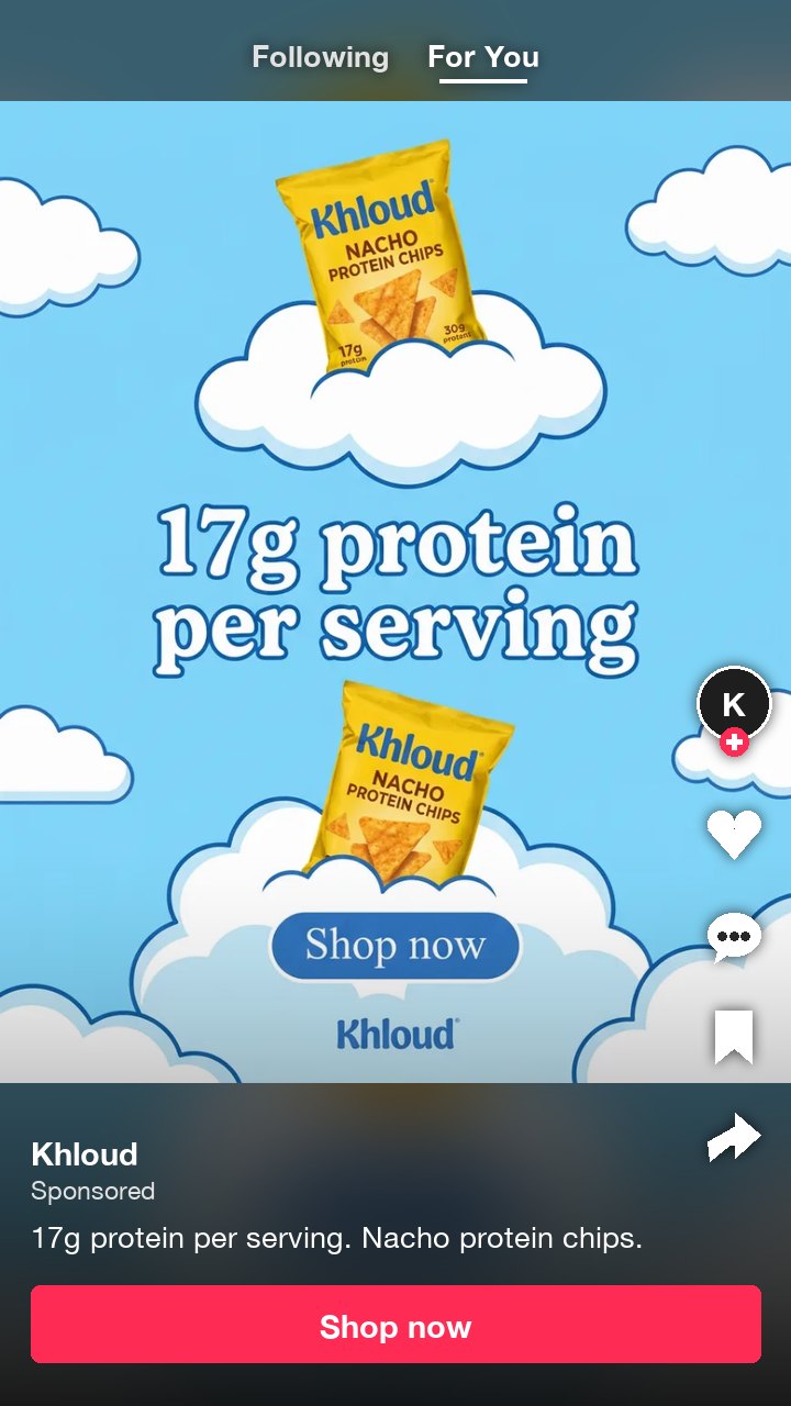 The Khloud nacho protein chips ad as a TikTok in-feed ad, ad text under 100 characters with no hashtag and no mention