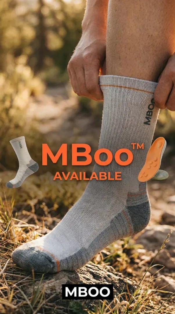 A Selzee ad for MBoo: a hiker pulling on a grey sock, with the words MBoo available